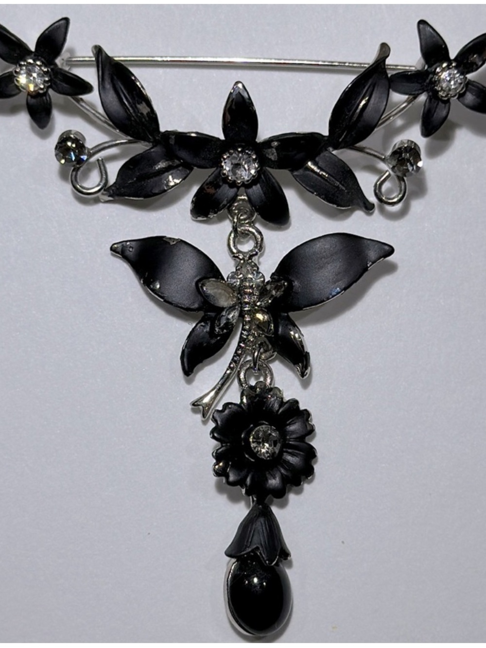 1980s Black & Silver With Rhinestone Flower & Butterfly Brooch